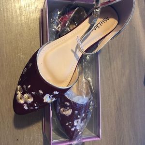 Red embroidered sandals